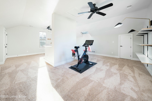 exercise room featuring carpet, baseboards, visible vents, lofted ceiling, and ceiling fan