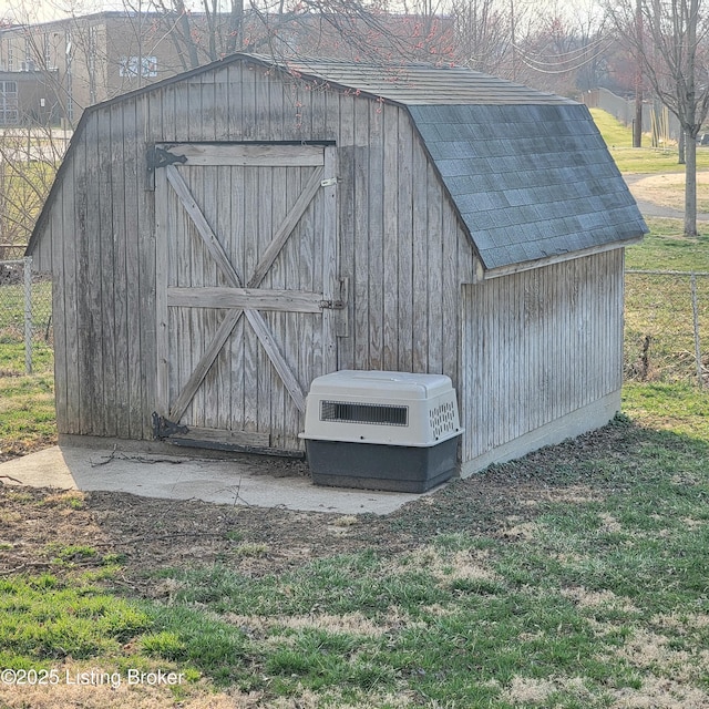 view of outdoor structure featuring an outdoor structure and fence