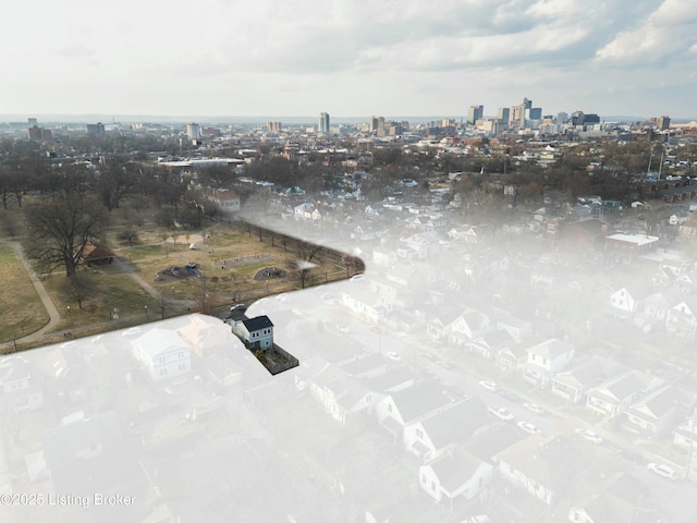 drone / aerial view with a view of city