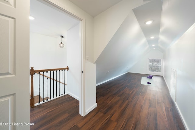 bonus room featuring wood finished floors, baseboards, visible vents, recessed lighting, and vaulted ceiling