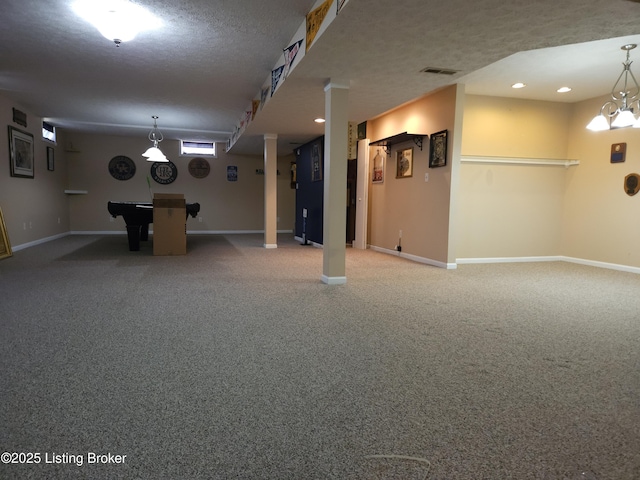 interior space with visible vents, carpet floors, and baseboards