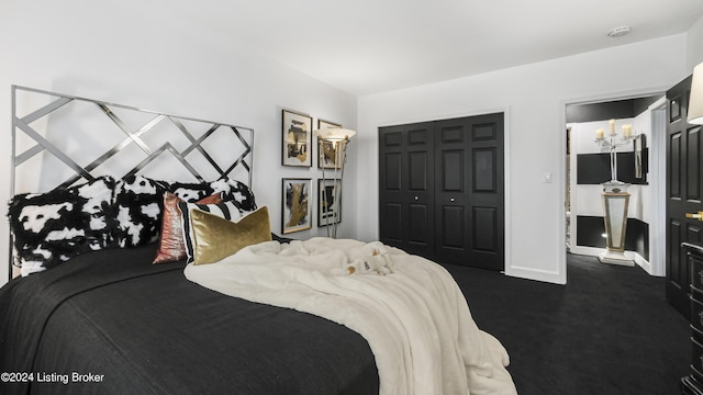 bedroom featuring a closet and baseboards