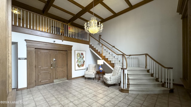 entrance foyer with baseboards, stairway, a towering ceiling, a notable chandelier, and coffered ceiling