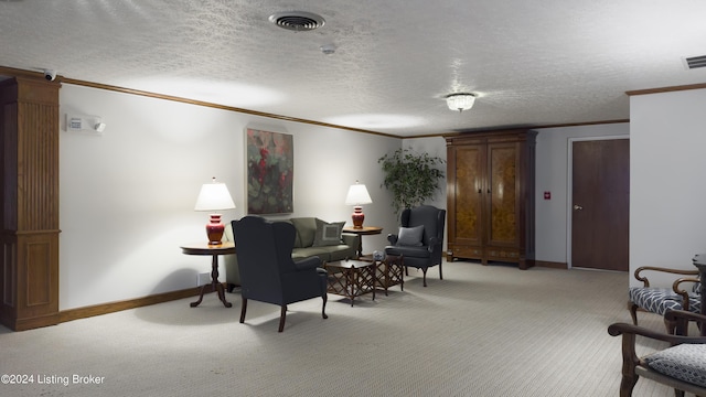 sitting room featuring visible vents, light colored carpet, and ornamental molding