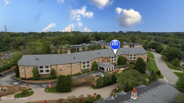 aerial view with a wooded view