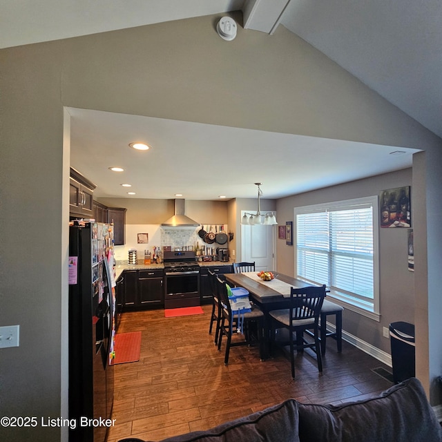 dining area with dark wood-style floors, recessed lighting, baseboards, and vaulted ceiling