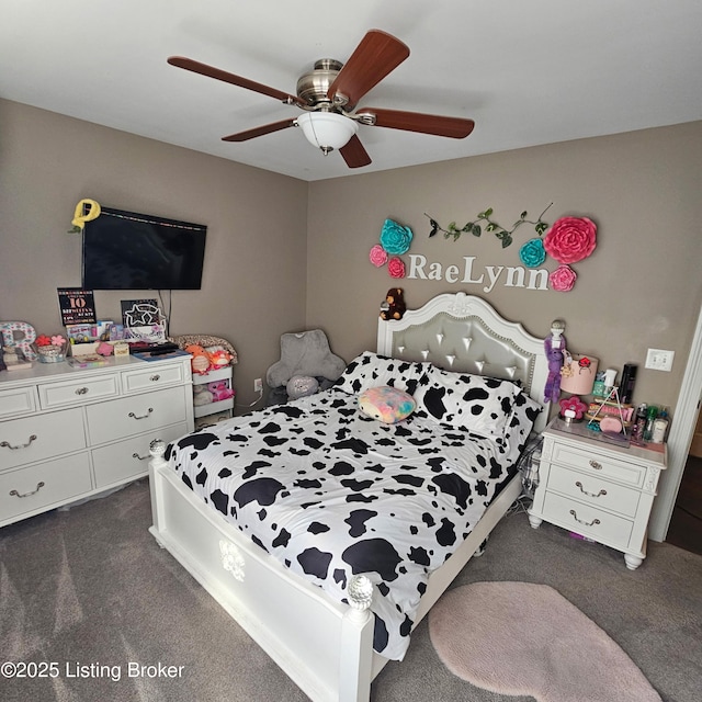 bedroom featuring dark colored carpet and ceiling fan