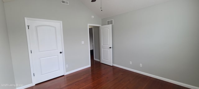 unfurnished bedroom featuring wood finished floors, visible vents, and baseboards