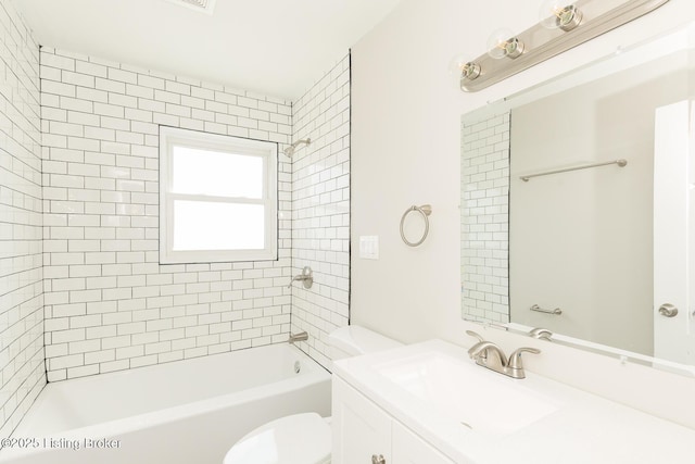 full bath featuring vanity, toilet, and shower / bathtub combination