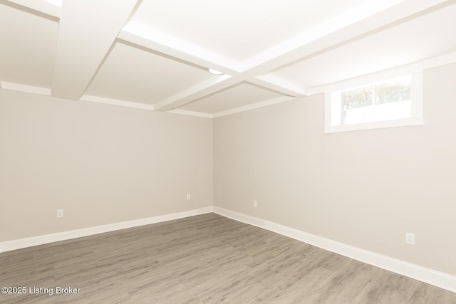 interior space featuring wood finished floors and baseboards