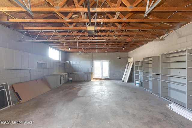 garage featuring concrete block wall