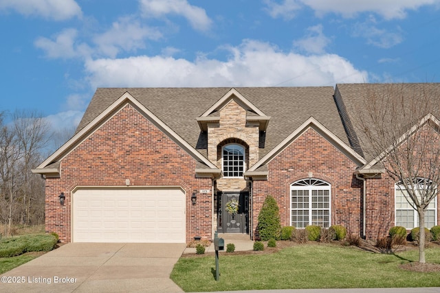 traditional-style home with brick siding, a front lawn, concrete driveway, and a garage