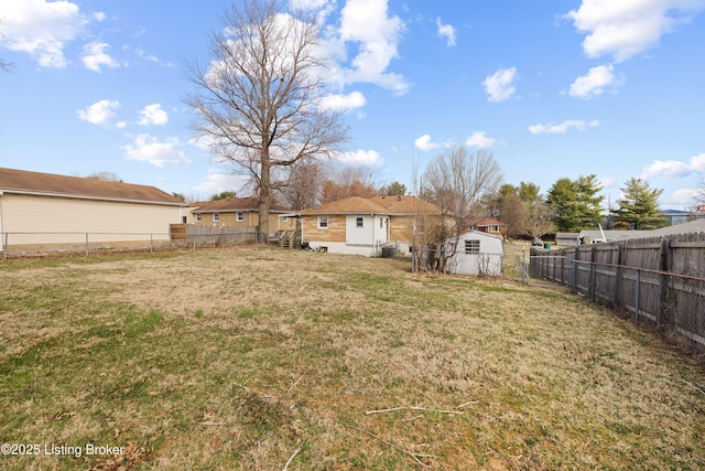 view of yard with a fenced backyard