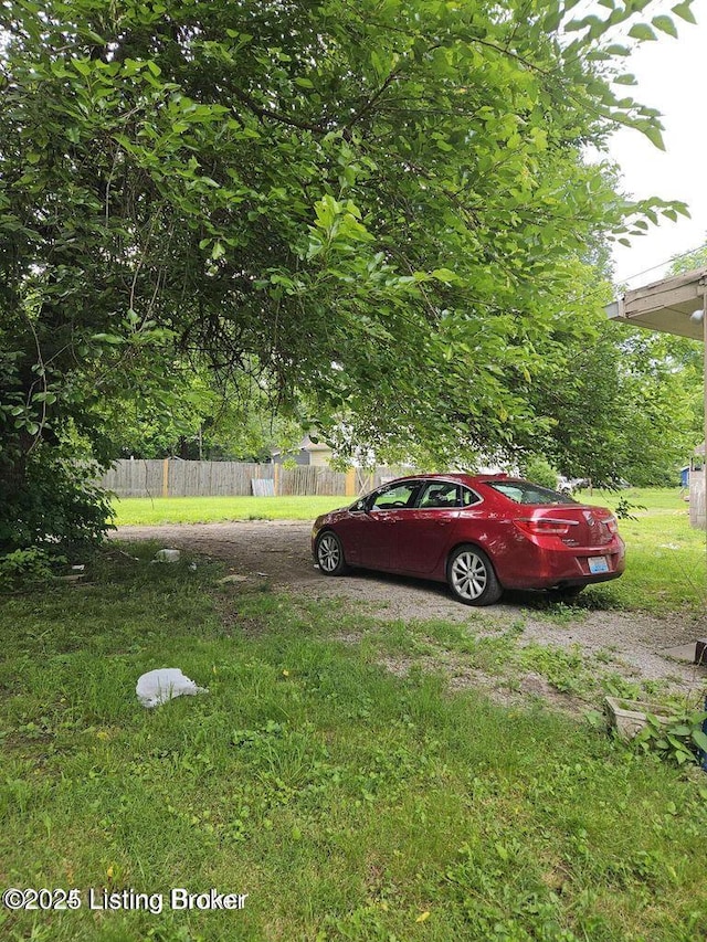 view of yard with fence