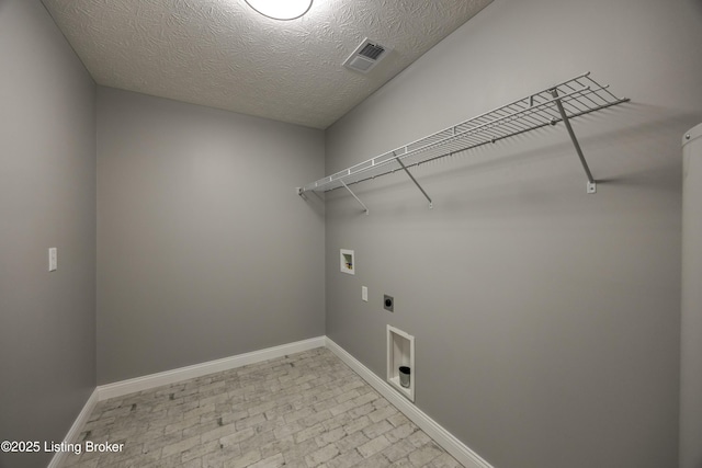 laundry area with visible vents, washer hookup, baseboards, hookup for an electric dryer, and laundry area