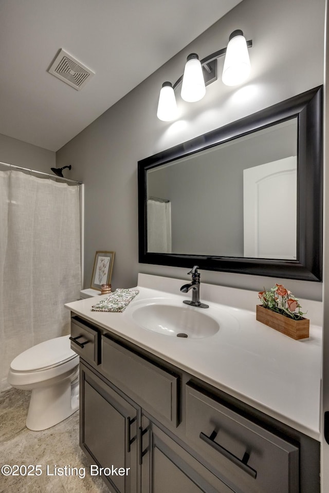 bathroom with visible vents, toilet, vanity, and a shower with curtain