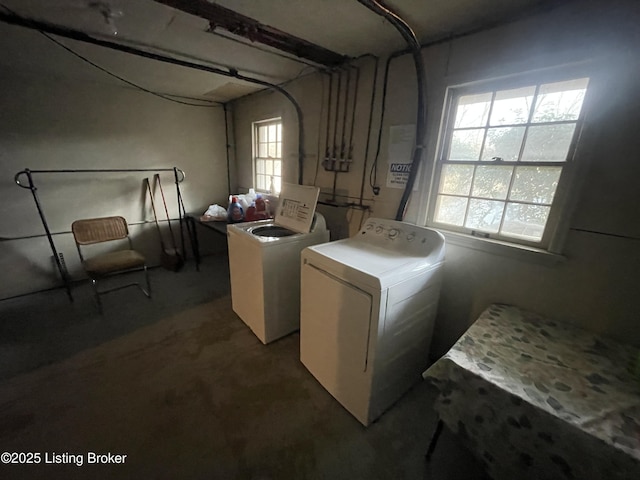 washroom featuring independent washer and dryer