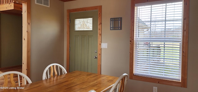 dining space with visible vents