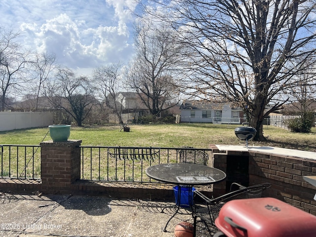 view of patio / terrace with fence