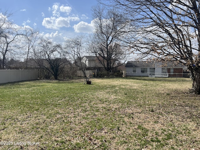 view of yard with fence