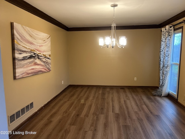 unfurnished dining area with visible vents, dark wood-style floors, a chandelier, and ornamental molding