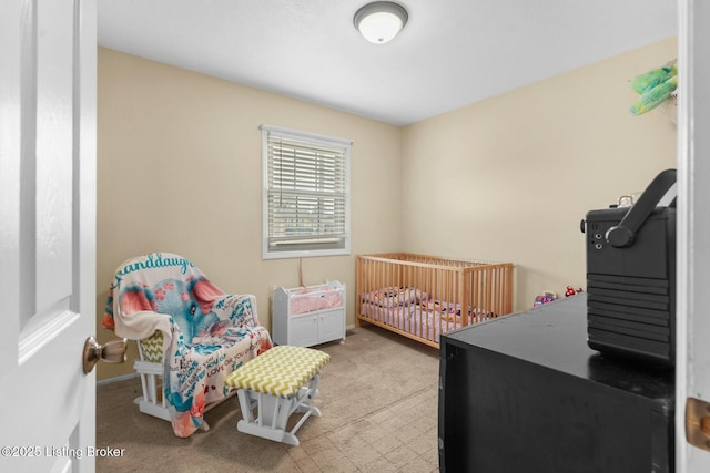 carpeted bedroom with baseboards