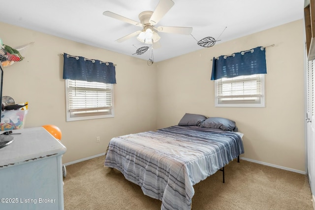 bedroom featuring baseboards, carpet, and a ceiling fan