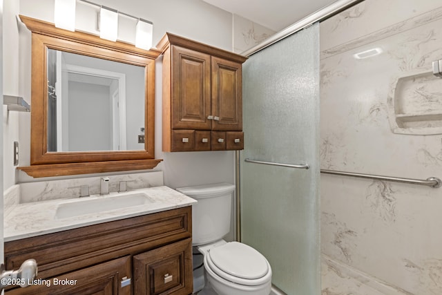 full bathroom with a stall shower, toilet, and vanity