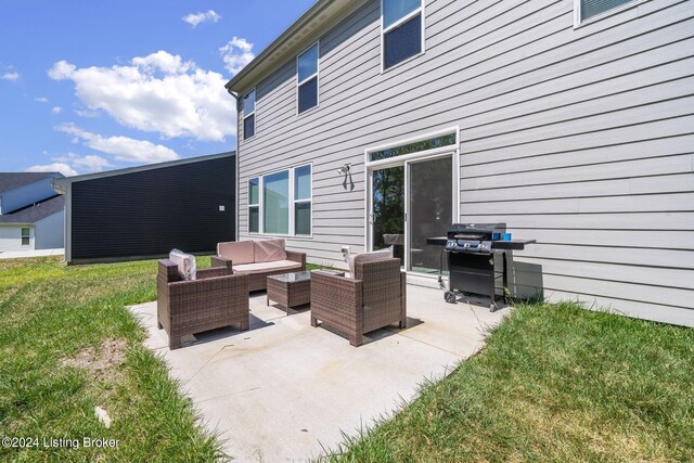 view of patio / terrace with an outdoor living space and a grill