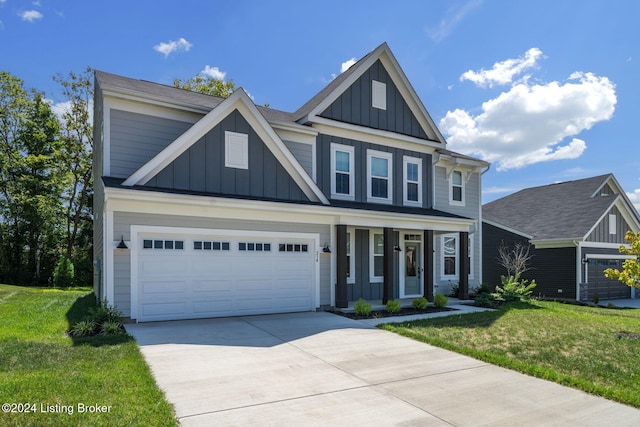 view of front facade with driveway, covered porch, board and batten siding, a front yard, and a garage