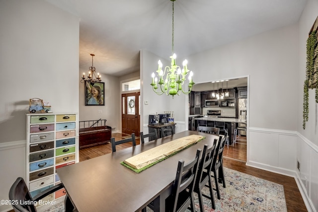 3140 Yorkshire Dr, Bardstown, KY 40004 - dining area featuring dark wood-style flooring, a wainscoted wall, and a notable chandelier
