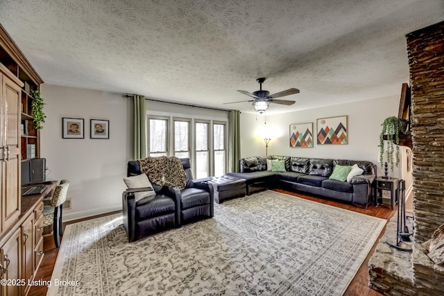 3140 Yorkshire Dr, Bardstown, KY 40004 - living area with dark wood-type flooring, a textured ceiling, ceiling fan, and baseboards