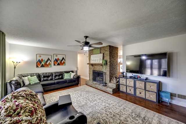 3140 Yorkshire Dr, Bardstown, KY 40004 - living area featuring a textured ceiling, a fireplace, wood finished floors, and a ceiling fan