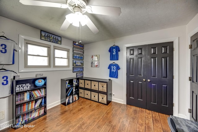 3140 Yorkshire Dr, Bardstown, KY 40004 - interior space with a textured ceiling, ceiling fan, baseboards, and light wood-type flooring