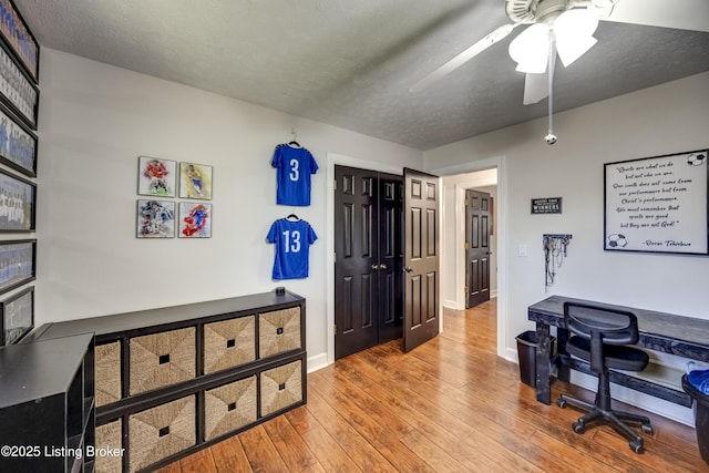 3140 Yorkshire Dr, Bardstown, KY 40004 - home office featuring hardwood / wood-style floors, a textured ceiling, baseboards, and ceiling fan