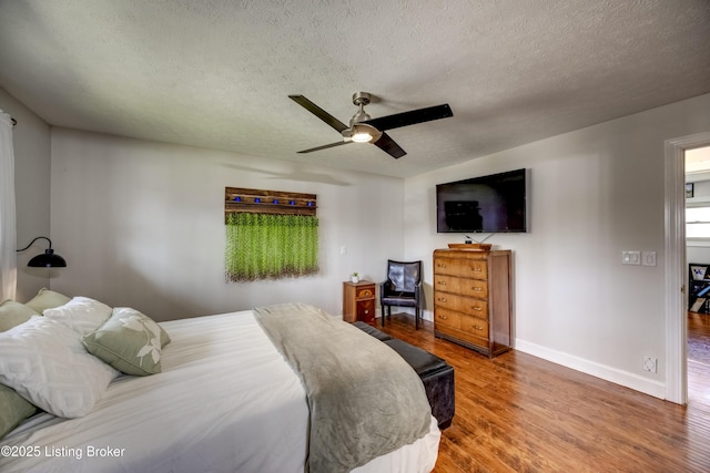 3140 Yorkshire Dr, Bardstown, KY 40004 - bedroom with a textured ceiling, baseboards, and wood finished floors
