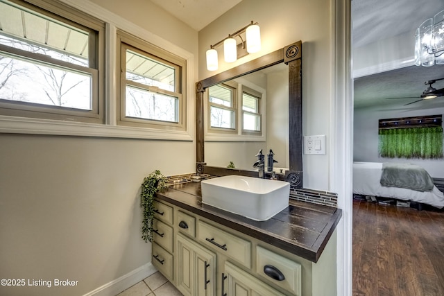 3140 Yorkshire Dr, Bardstown, KY 40004 - bathroom featuring baseboards, wood finished floors, and vanity