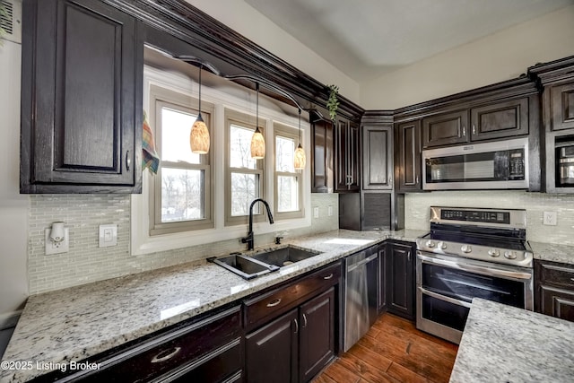 3140 Yorkshire Dr, Bardstown, KY 40004 - kitchen with a sink, dark brown cabinetry, appliances with stainless steel finishes, and dark wood finished floors