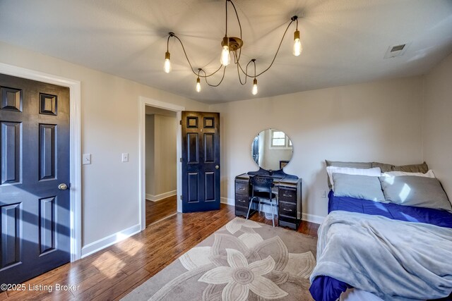 3140 Yorkshire Dr, Bardstown, KY 40004 - bedroom with baseboards, visible vents, and wood finished floors