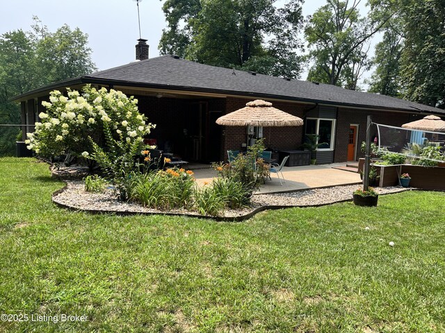 3140 Yorkshire Dr, Bardstown, KY 40004 - rear view of property with a patio, brick siding, a chimney, and a yard