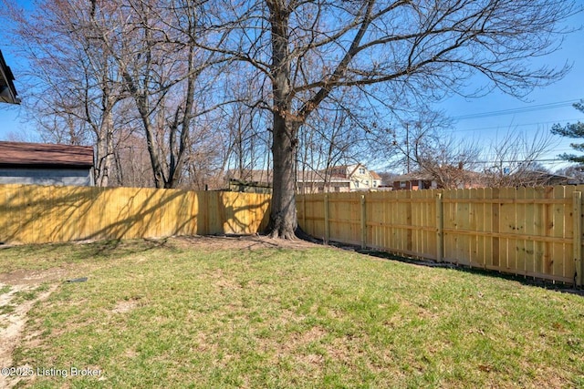 view of yard featuring a fenced backyard