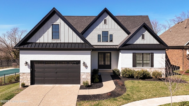 modern inspired farmhouse with brick siding, board and batten siding, french doors, metal roof, and a standing seam roof
