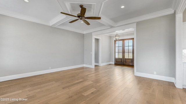 unfurnished room with crown molding, baseboards, light wood-style flooring, ceiling fan with notable chandelier, and coffered ceiling