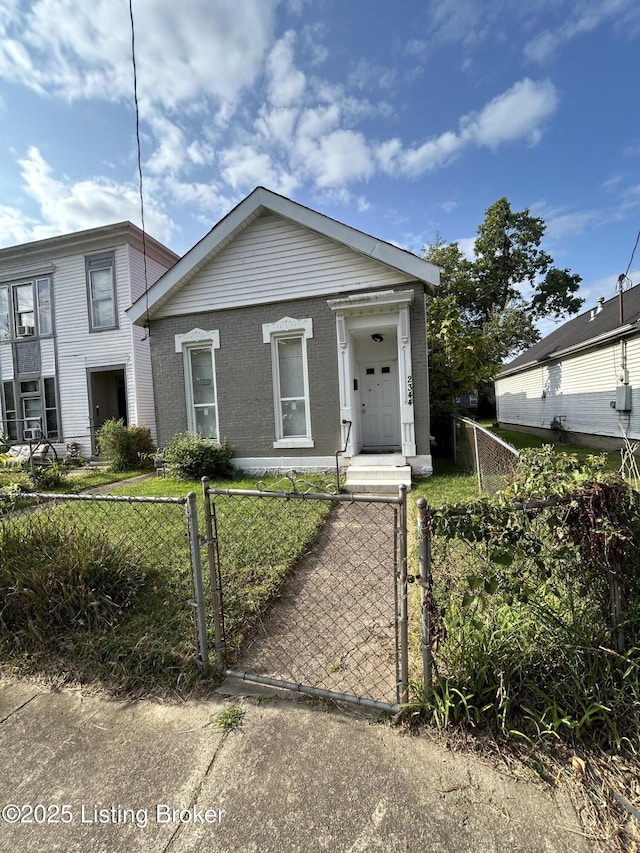 view of front of property with a gate and a fenced front yard