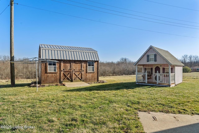 268 Cobb Rd, Eminence, KY 40019 - view of yard with a storage unit and an outdoor structure