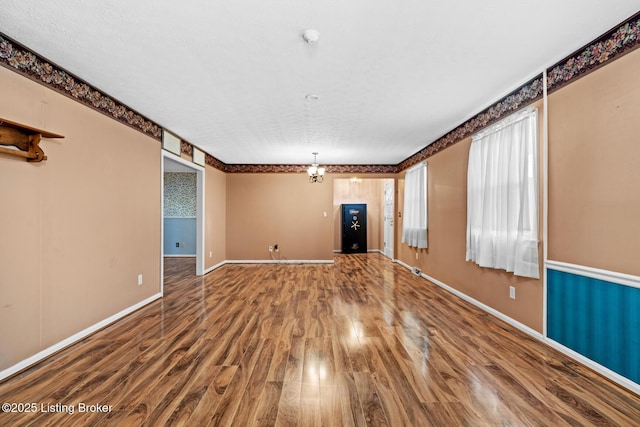 268 Cobb Rd, Eminence, KY 40019 - unfurnished living room with baseboards and wood finished floors