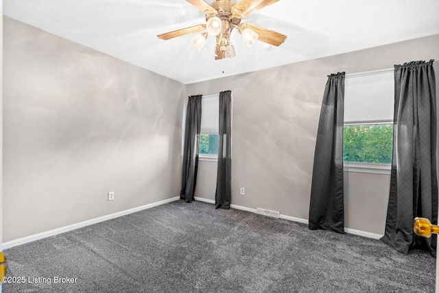 268 Cobb Rd, Eminence, KY 40019 - empty room featuring a ceiling fan, a wealth of natural light, carpet flooring, and visible vents