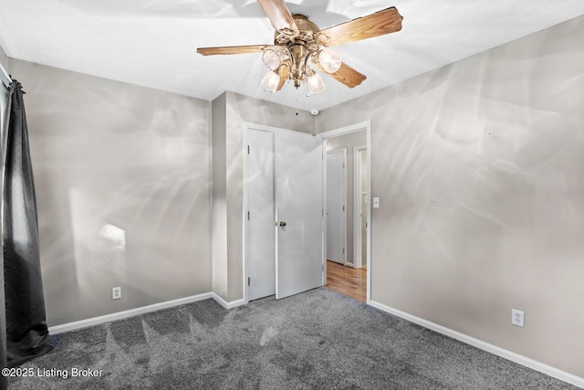 268 Cobb Rd, Eminence, KY 40019 - unfurnished bedroom featuring baseboards, carpet flooring, and a ceiling fan