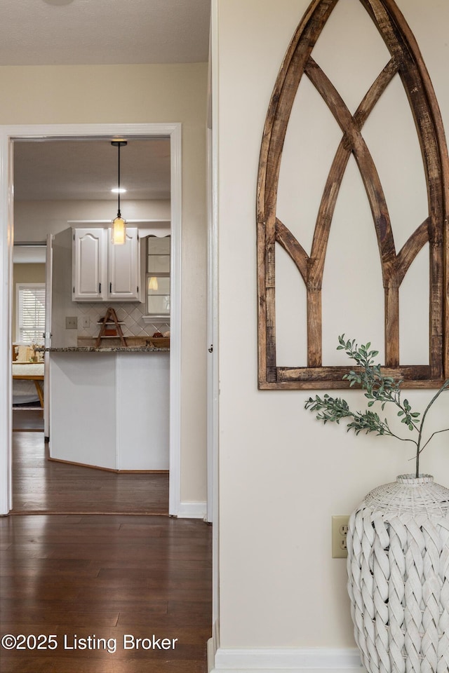 4316 Arwine Ct, Louisville, KY 40245 - hallway with dark wood-style flooring