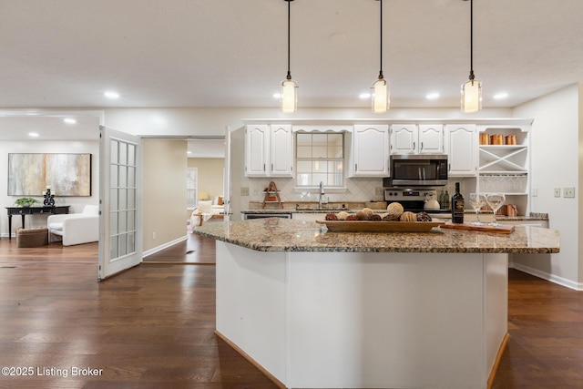4316 Arwine Ct, Louisville, KY 40245 - kitchen with open shelves, backsplash, dark wood-style floors, appliances with stainless steel finishes, and white cabinets